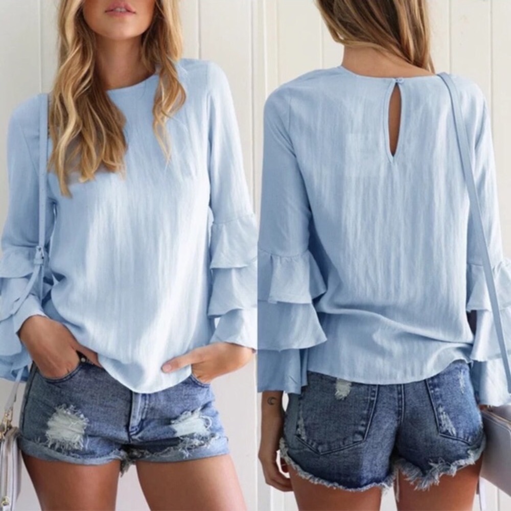 NEW. Long sleeve blue top